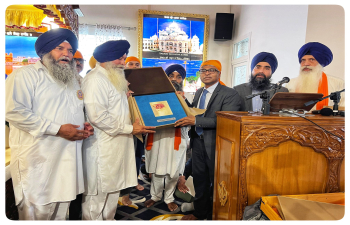 Officials of the Indian Consulate participated in the ceremony of inauguration of Gurudwara Singh Sabha, Flero in Brescia, Italy on 27 October 2024. They also joined with the devotees in prayers and the Langar held on this occasion. The Consul General Mr Lavanya Kumar, on behalf of the Consulate, presented a copy of the special edition of the biography of Shri Guru Nanak Dev ji to the management of Gurudwara.